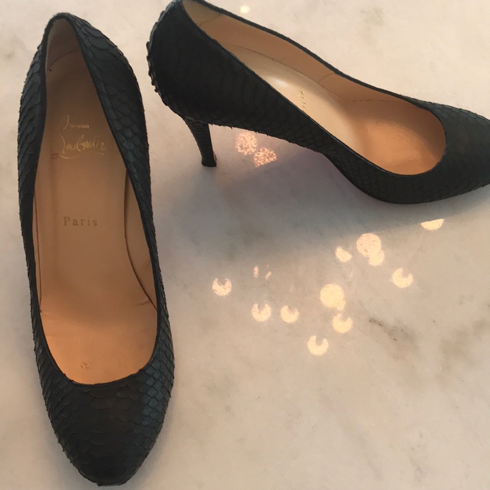 Christian Louboutin snake skin pumps
